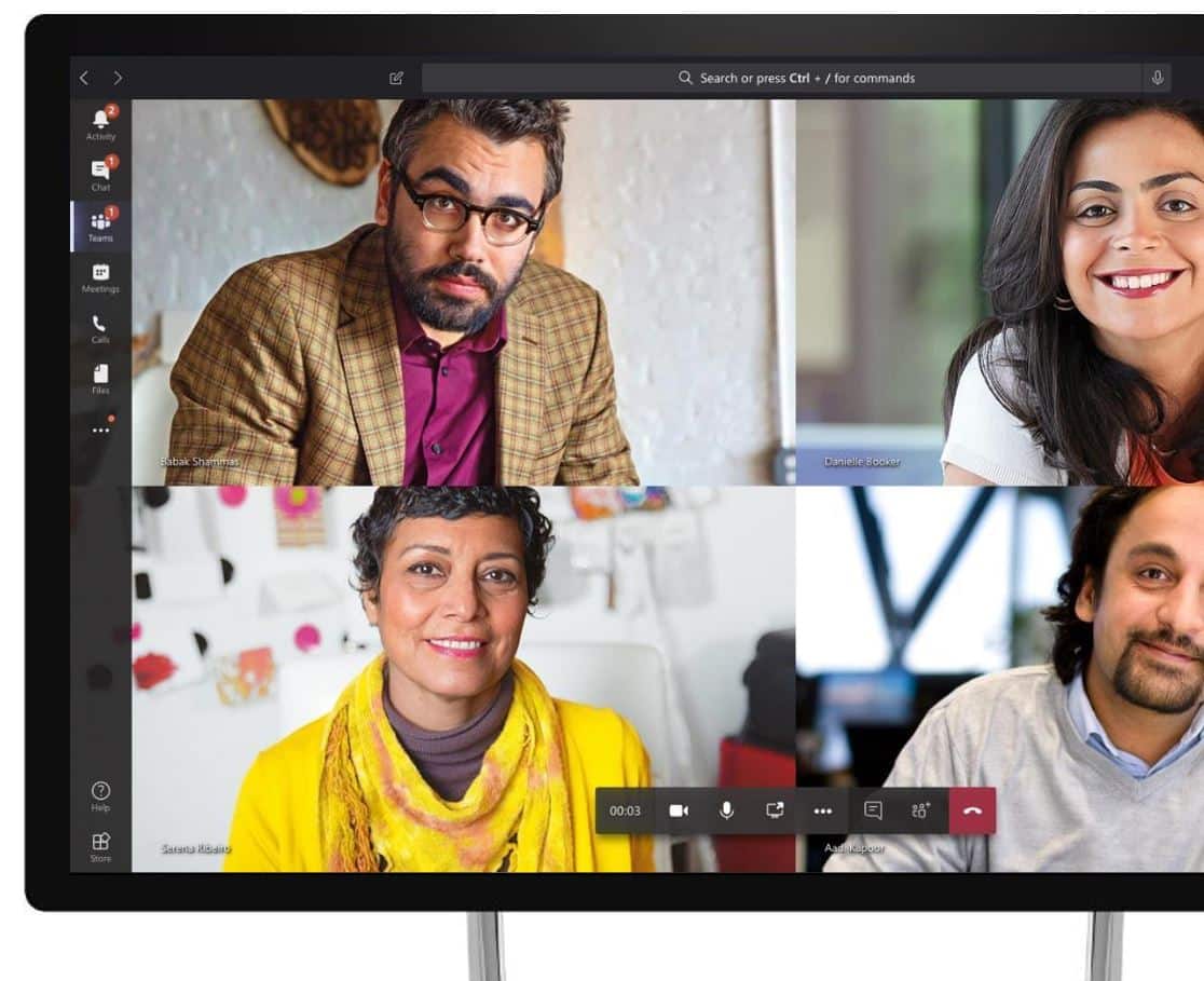 Computer screen showing four people on Microsoft Teams
