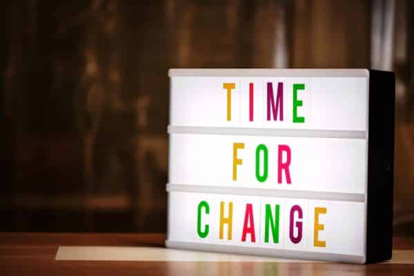 Time for a change written in different coloured letters in cinematic lightbox